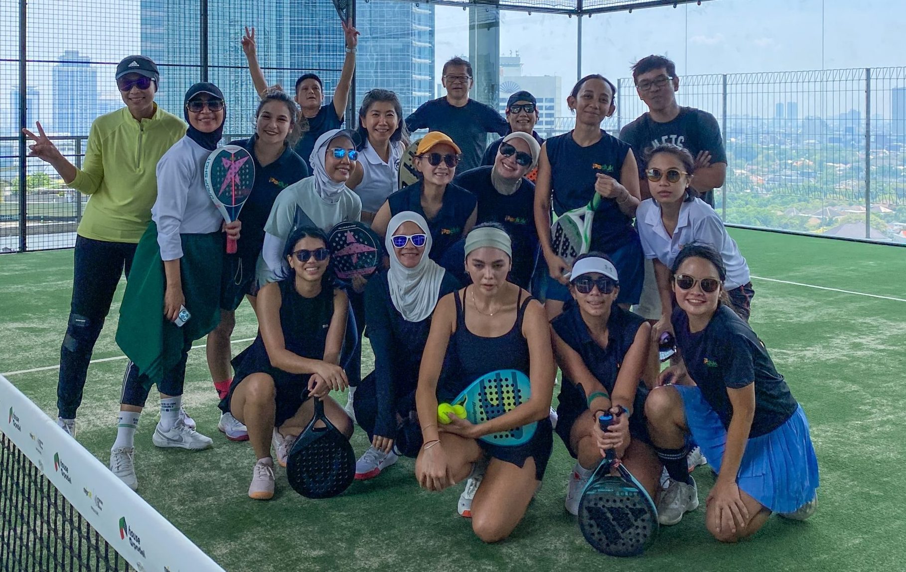 a group of people playing padel